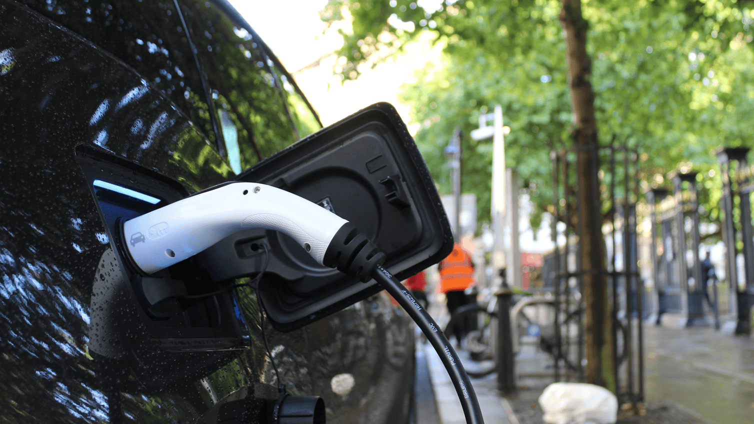 Photo of an electric vehicle using a public chargepoint