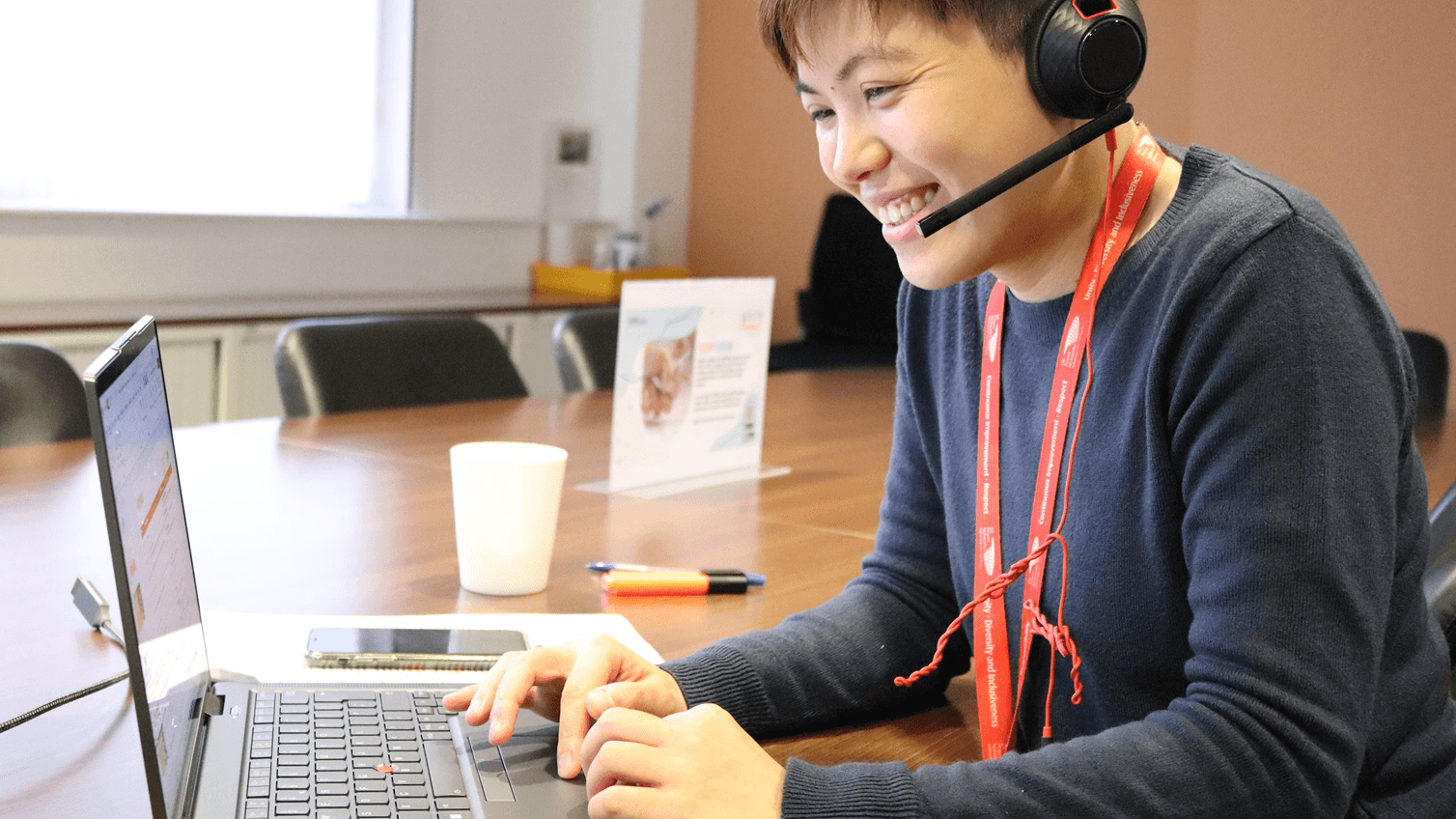 Photo of a member of the Local Net Zero team on a call